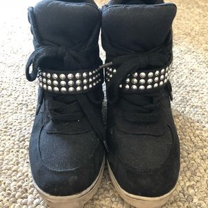 Black studded wedge sneakers